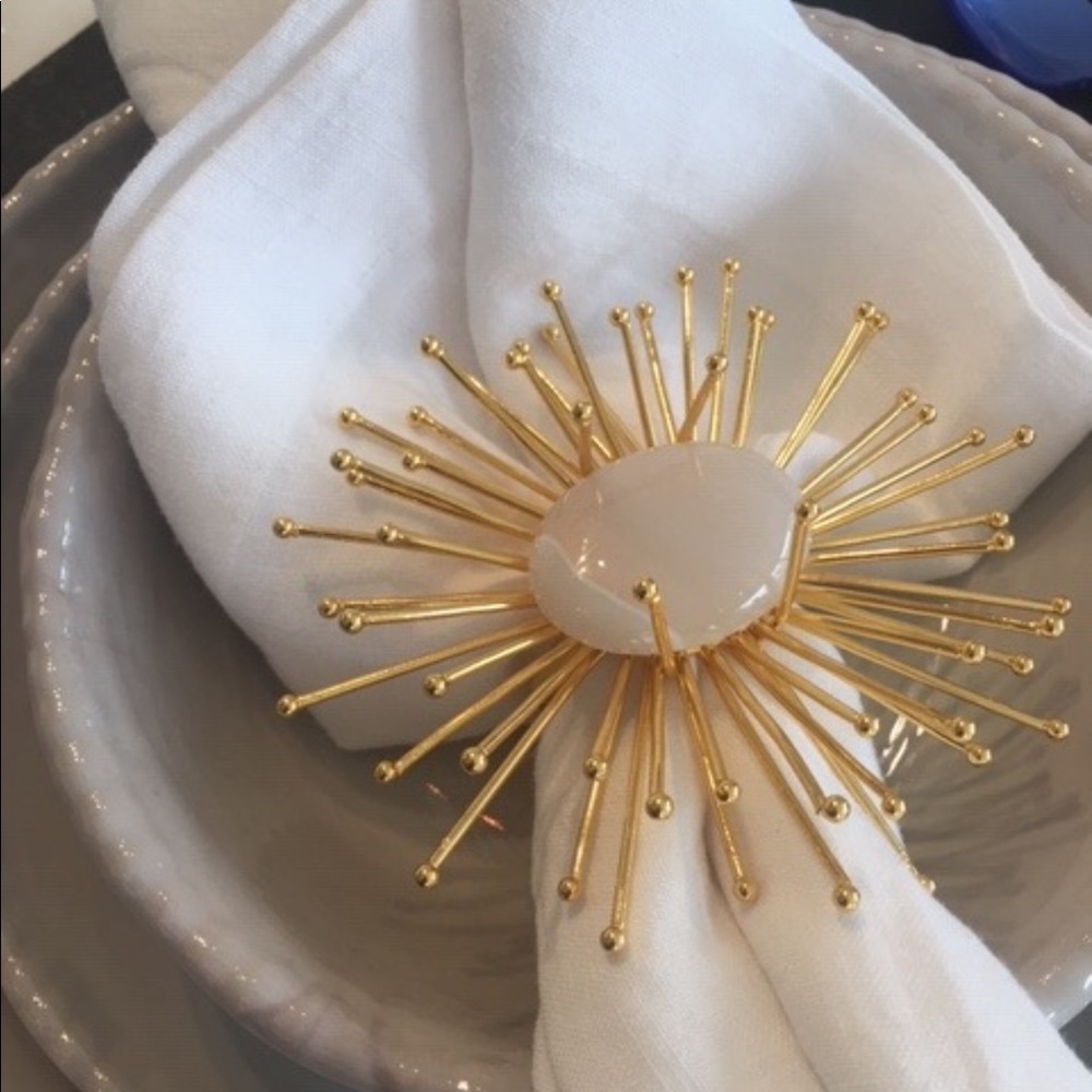 Assorted napkin rings with gold spikes